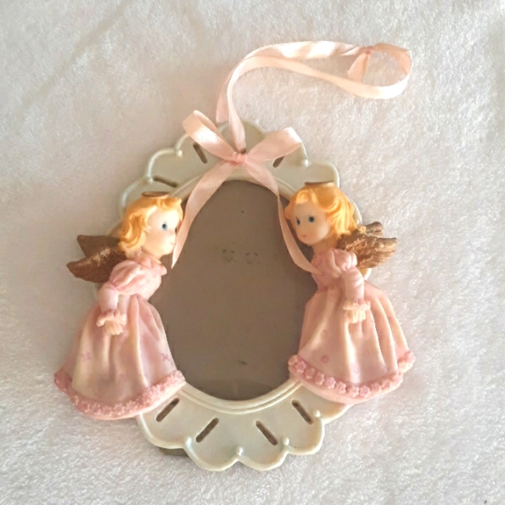 Angel photo frame with pink ribbon
